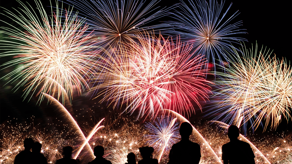 A display of fireworks lights up a night sky. Content creators will add the best explosion and firework sound effects to their videos of the event.