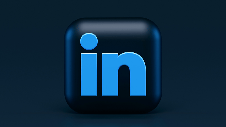  A 3d Linkedin logo sits on a dark background. Linkedin can now support videos, using royalty free music for Linkedin videos.